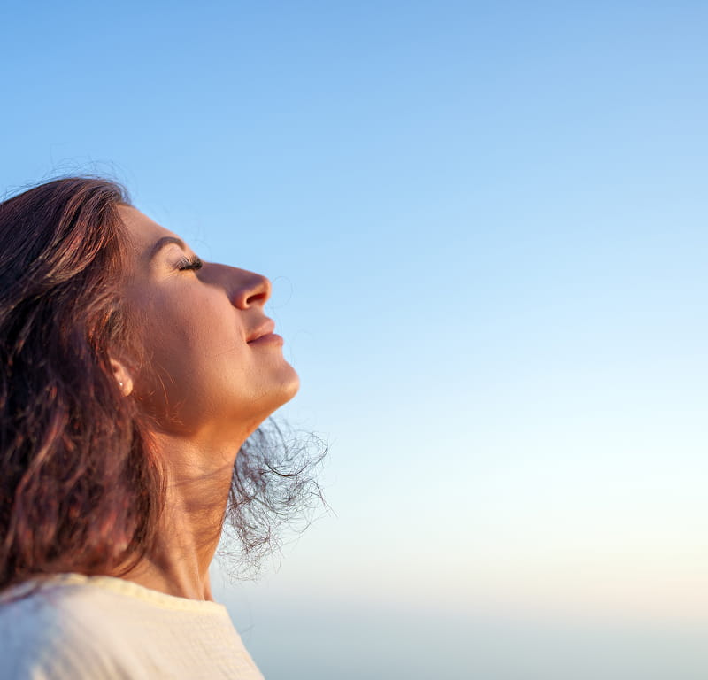 Woman breathing clear air